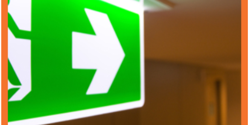 Blue Sign on a Fire Door for Fire Safety